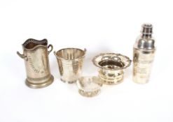 A plated cocktail shaker, with presentation inscription; a plated wine bottle coaster with vine