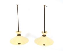 A pair of cream Terre D'Hautaniboul pendant lights, 63cm high, 33cm dia.