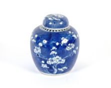 A Chinese blue and white ginger jar and cover, having prunus decoration, four character mark to
