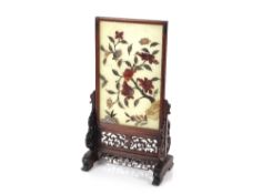A 19th Century rectangular jade Chinese table screen, on carved and pierced wooden stand, 39cm high