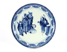 A Chinese circular blue and white shallow dish, decorated with dignitaries and other figures
