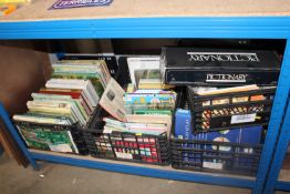 Four boxes of various books and games