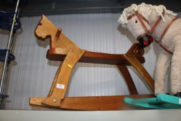 A wooden rocking horse