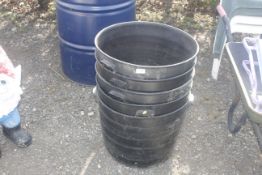 Five plastic garden planters