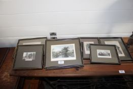 A collection of various coloured prints, mostly re