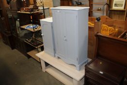 A painted pine pot cupboard; a painted pine two door cabinet and a modern coffee table