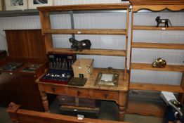 A pine dresser fitted three drawers