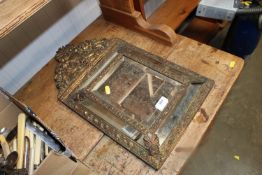A gilt framed and bevel edged wall mirror