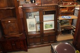 An Old Charm style display cabinet raised on cupbo