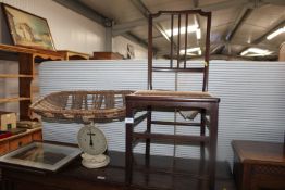 A set of Salter scales and a spindle back dining c