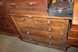 An oak chest fitted two short over three long draw