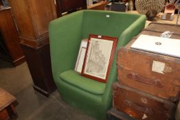 A Modus green upholstered armchair