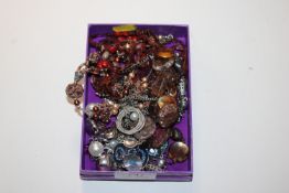 A box containing various costume jewellery to incl