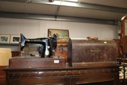 A Singer sewing machine in fitted case