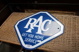 A reproduction RAC advertising sign (217)