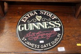 A reproduction Guinness advertising sign (224)