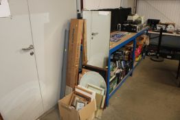 A collection of various prints, picture frames and