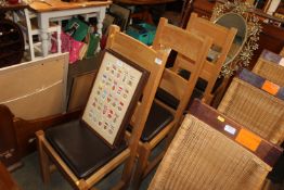 A set of four light oak bar back dining chairs tog