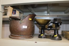 A copper coal scuttle together with a set of scale
