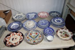 A collection of various blue and white china to in