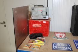 A Eumig Mk.501 projector; a Eumig mini camcorder;