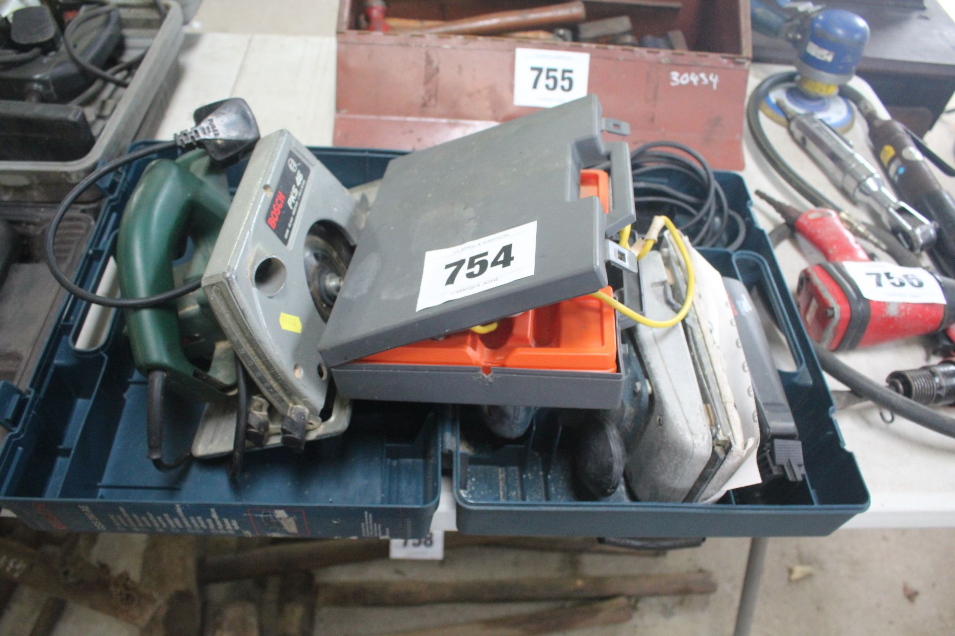 Bosch GSS280AE vibrating sander, soldering kit and Bosch circular saw.