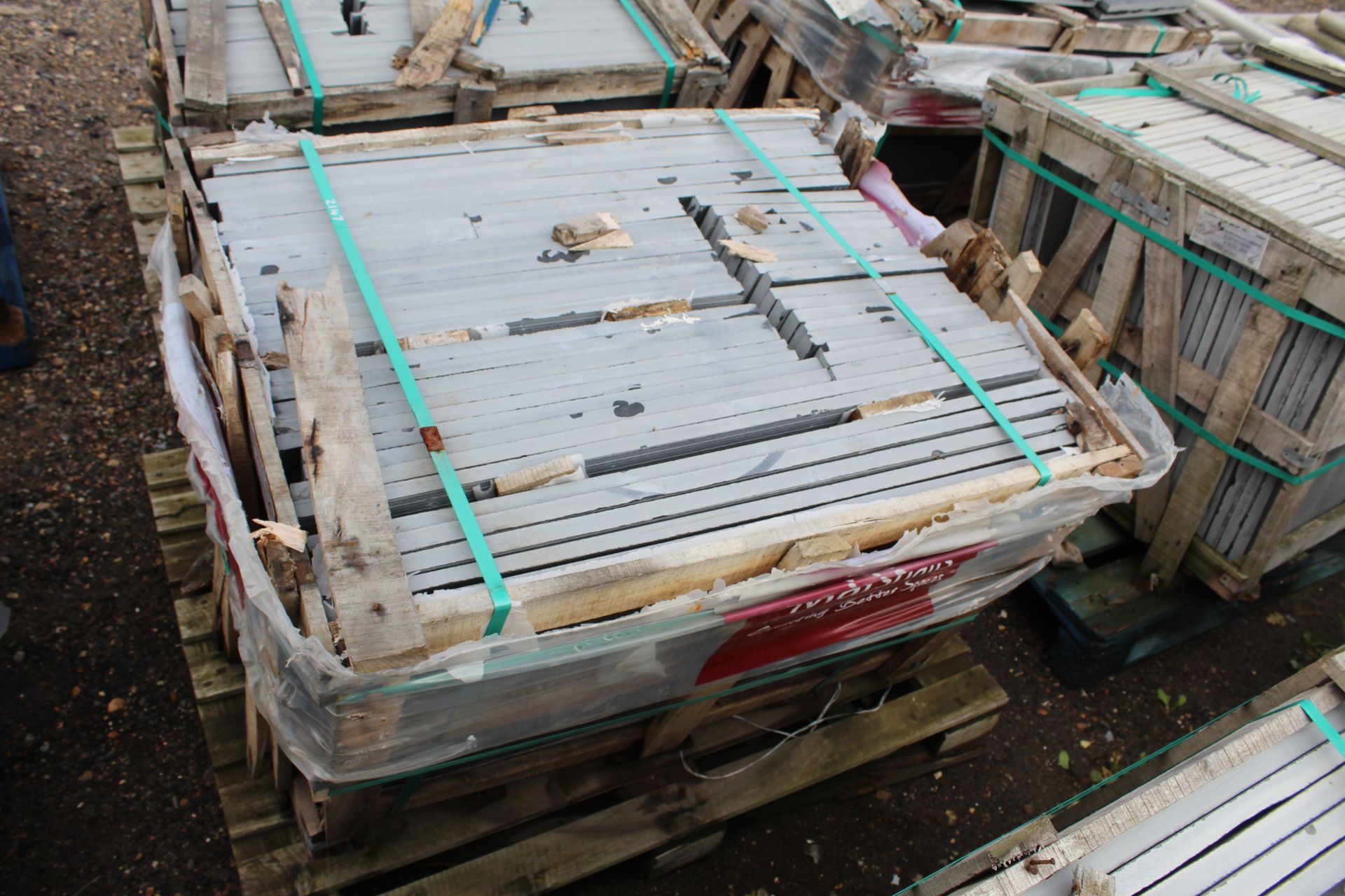 Damaged pallet conatining a quantity of Black Nat M/C sawn stone slabs. V