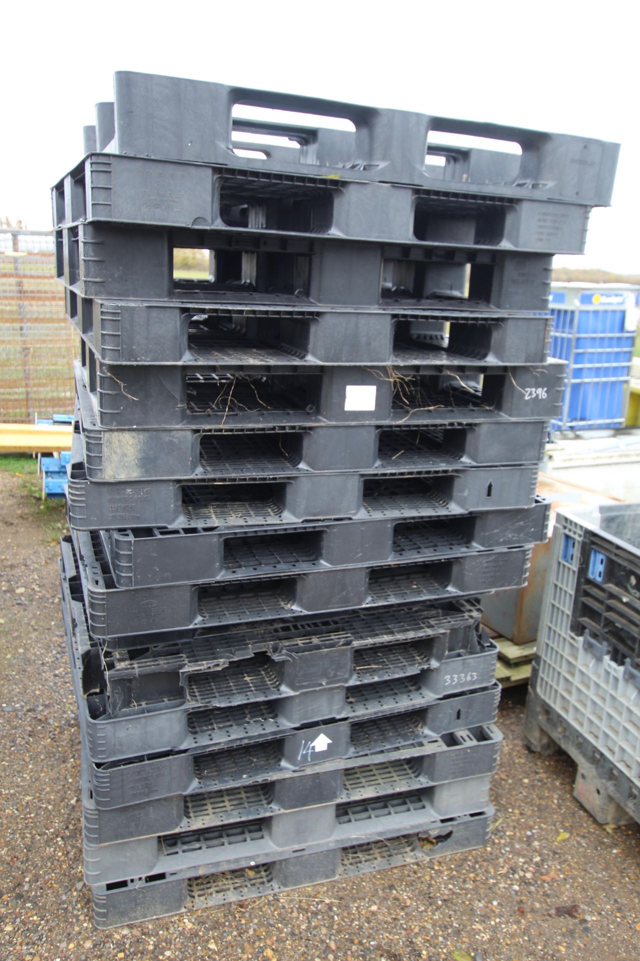 Quantity of plastic pallets.
