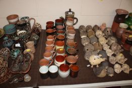 A quantity of Studio Pottery mugs to include Wold