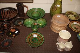 A quantity of green glazed Studio Pottery all mark
