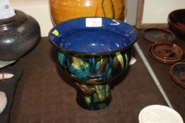 A Wesuma Pottery terracotta cylindrical vase glaze