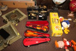A quantity of miniature brass instruments and two