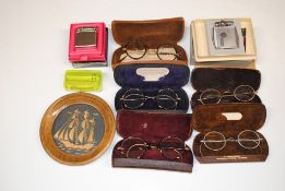 Five pairs of vintage spectacles and various light
