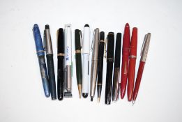 A box of mixed fountain pens to include Waterman,