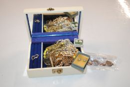A jewellery box and contents of various costume je