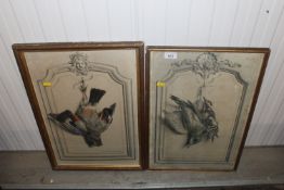 A pair of gilt framed and glazed prints of birds a