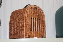 A wicker pet crate
