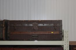 A wooden and metal bound trunk AF