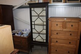 An astragal glazed corner cabinet