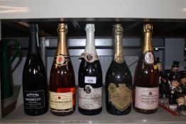 A collection of various alcohol to include Roche L