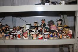 A quantity of various character jugs