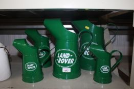 A set of five graduated reproduction Land Rover oi
