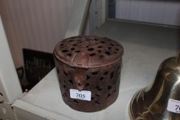 A pierced iron box (118)