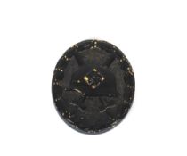 A German wound badge (black grade) marked L-11