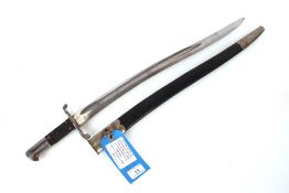 A British model 1856 sword bayonet with scabbard.
