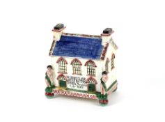 A 19th Century Wesleyan Chapel English Pottery money box, inscribed 'W. Butler, Bennington, born