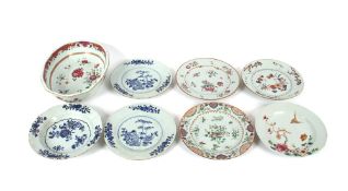 A pair of 19th Century Chinese plates, decorated bamboo shoots and floral sprays; a similar