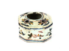 A Delft inkwell, of octagonal form with painted floral trailing decoration, 11.5cm wide