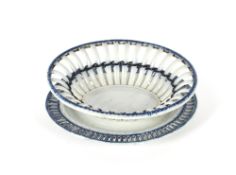 A pair of antique pearlware chestnut baskets on stands, with pierced borders and entwined linked