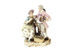 A 19th Century Meissen porcelain figure group, depicting maid and gallant in garden with floral